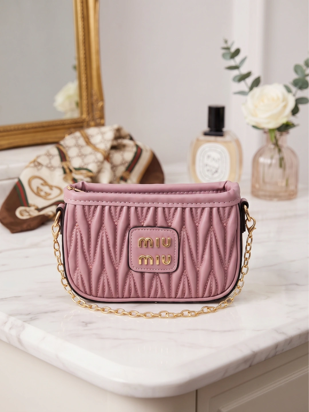Pudra Pembe Kapitone Desenli Zincir Askılı Mini Çanta
